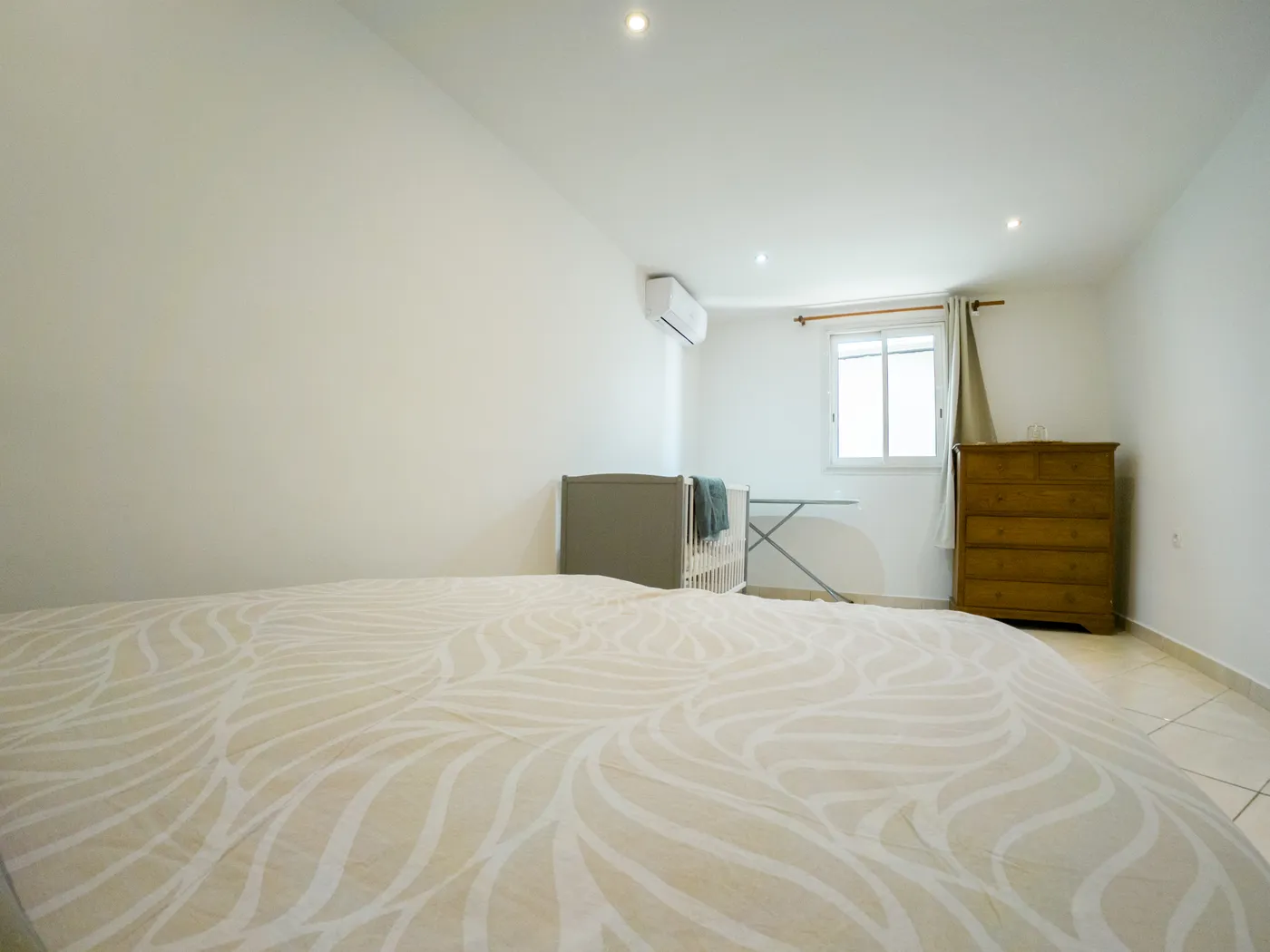 Chambre climatisée de la villa 8 personnes à Ligne des Bambous